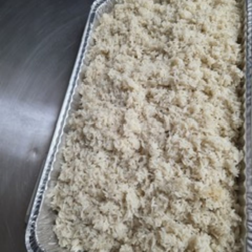 Sweet Fingers catering tray filled with rice.